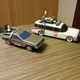 Illustration for article titled Ecto-1 or Delorean Time Machine?
